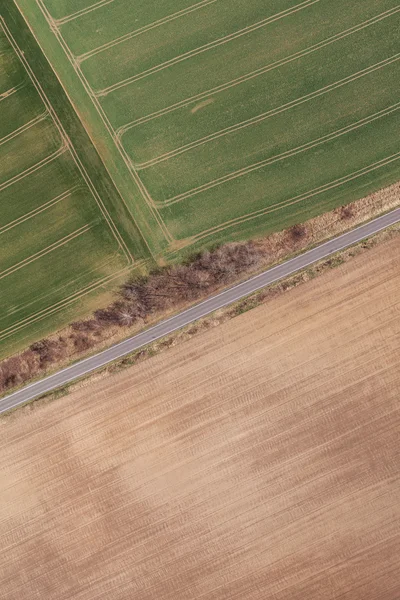Lente tijdvelden dorp oogst landschap — Stockfoto