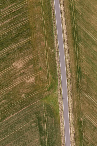 Spring time village harvest fields landscape — Stock Photo, Image