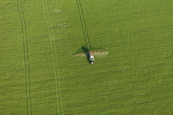 Harvest fields with tractor — Stock Photo, Image