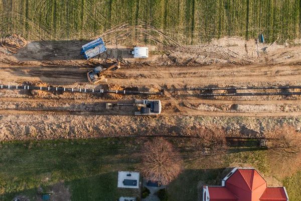 Aerial view of burying gas pipe in a country area — Stock Photo, Image