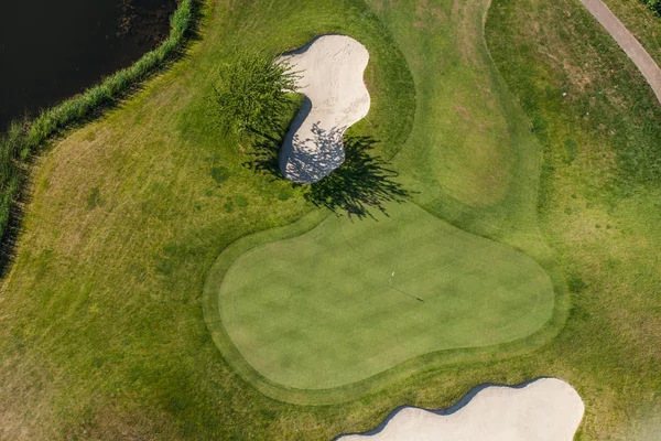 Aerial view over golf field bridge — Stock Photo, Image