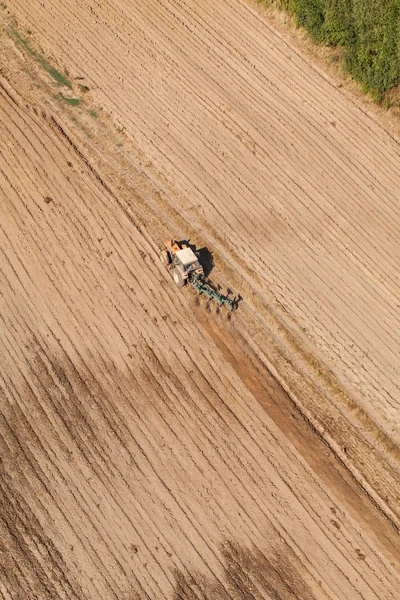 Campos de cosecha con tractor — Foto de Stock