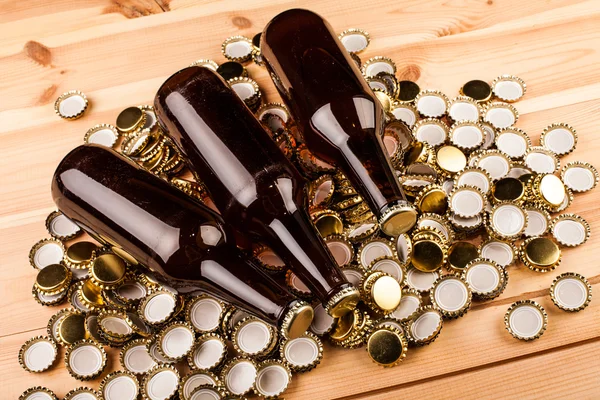 Bottles of homemade beer and caps