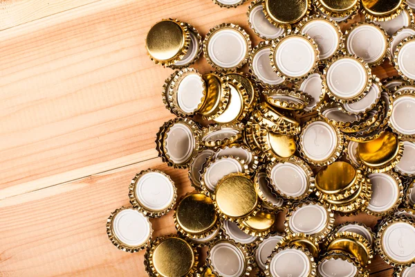 Bottles  of homemade beer  and bottle caps machine — Stock Photo, Image