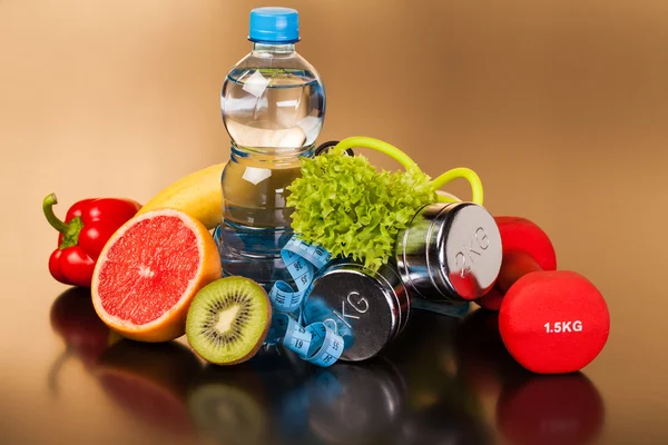 Fitnessapparatuur en gezonde voeding — Stockfoto