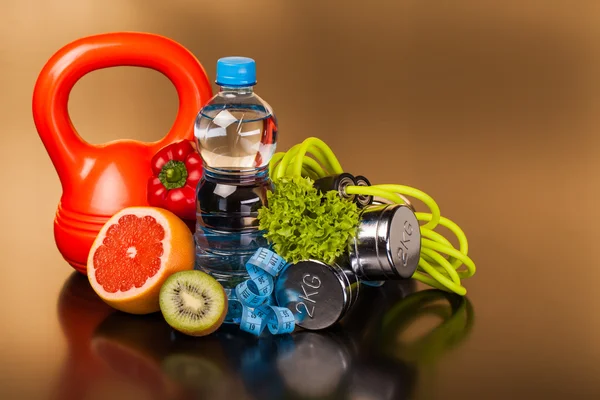 Fitness equipment and healthy food — Stock Photo, Image