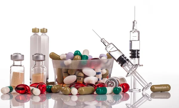 Variety medicines and syringes — Stock Photo, Image