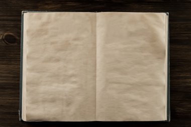 ahşap arka plan eski vintage kitap açın. Kağıdın iki temiz.