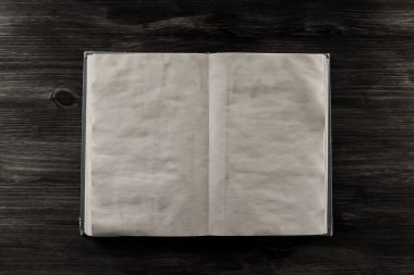 ahşap arka plan eski vintage kitap açın. Kağıdın iki temiz.