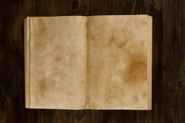 ahşap arka plan eski vintage kitap açın. Kağıdın iki temiz.