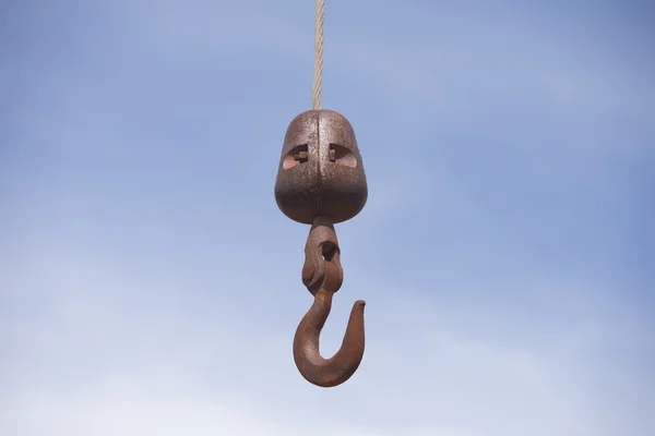 Rusty Iron hook against blue sky background — Stock Photo, Image