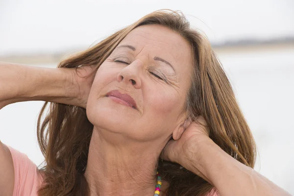 Relaxed happy attractive mature woman — Stock Photo, Image