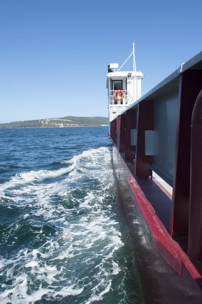 Industrial freighter vessel at ocean coast — Stock Photo, Image