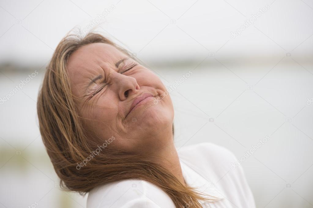 Depressed lonely woman crying in pain