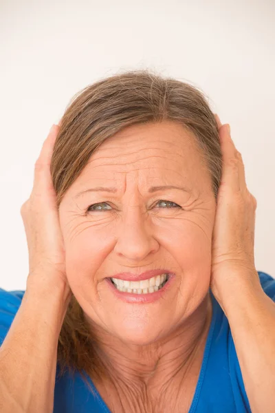 Woman migraine cover ears — Stockfoto