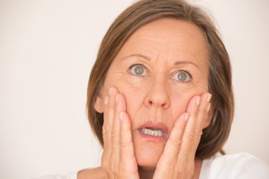 Scared shocked woman portrait