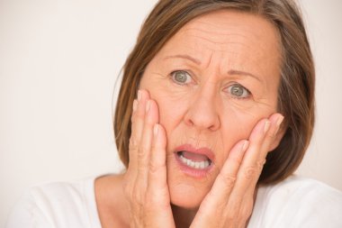 Upset Scared shocked woman portrait