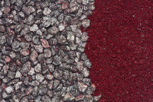 Background texture of dried and crushed Cochineal Insects, used to make scarlet colored dye.