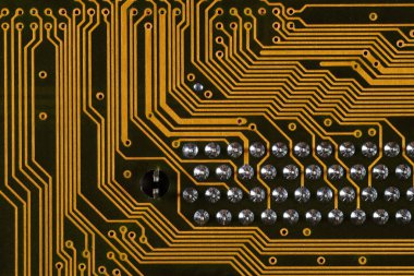 Yüzey bağlama bileşenlerini gösteren yazdırılmış devre kartı. Çok yakından..