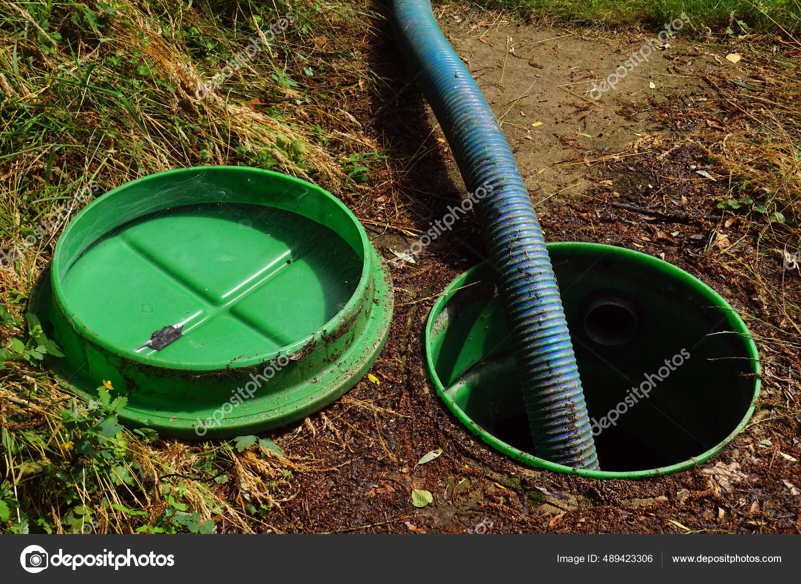 Pipe Drainage Pit Pumping Out Sewage Septic Tank Stock Photo by