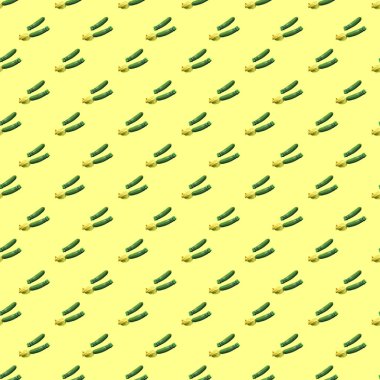 Sarı arka planda, kusursuz yeşil kabak deseni.