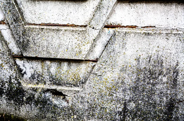 Old concrete wall art abstraction, background, and structure.
