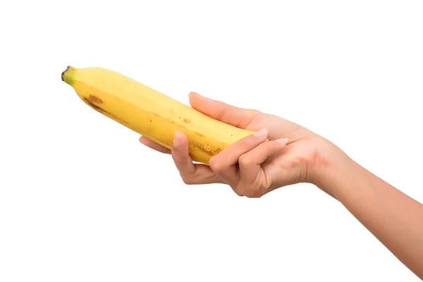 Hand som håller en banan — Stockfoto