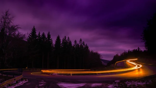 Car Light Lines Mountain Asphalt Road Evening Trees Cloudy Sky — Stock Photo, Image