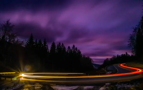 Car Light Lines Mountain Asphalt Road Evening Trees Cloudy Sky — Stock Photo, Image