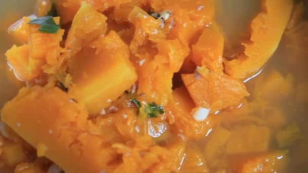 Pumpkin soup cooked pork — Stock Video