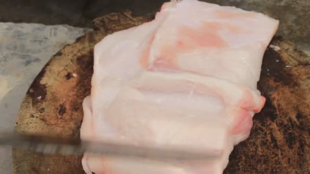 Pork processing with knife — Stock Video