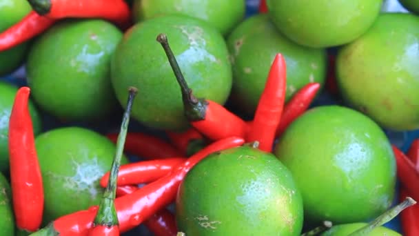 The lemon and chillis in the basket — Stock Video