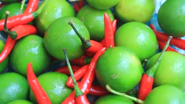 The lemon and chillis in the basket — Stock Video