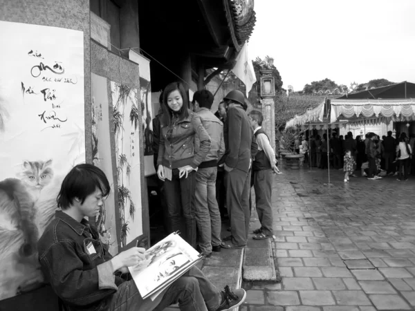 The artist is drawing portrait — Stock Photo, Image