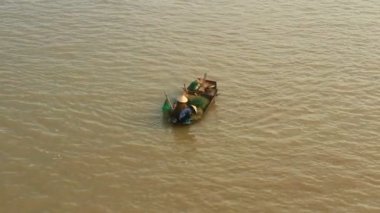 Fishermen catch fish in the river