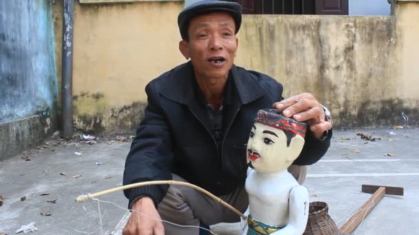 HAI DUONG, VIETNAM, ремесленники и куклы воды во Вьетнаме — стоковое видео