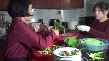 February 09, 2026. Chu Van An, Hai Phong, Vietnam. Betel leaves and areca nuts. the woman preparing betel nuts