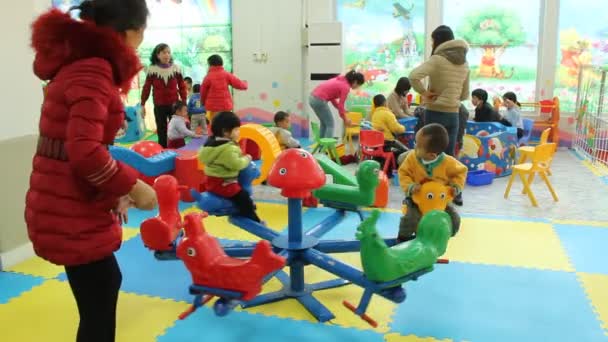 Children in play area — Stock Video