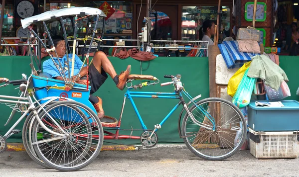 Tricycle bicycle taxi parking at the street — Stock Photo, Image