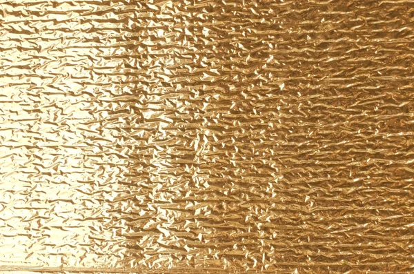 Gold aluminum foil texture. — Stock Photo, Image