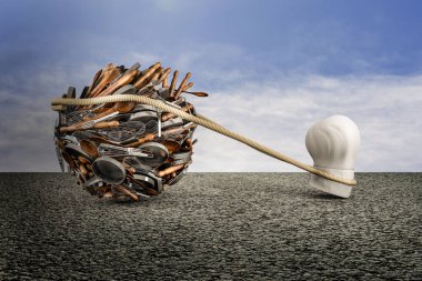 Aşçı şapkası asfalta dizilmiş mavi gökyüzü arkaplanlı büyük bir çatal bıçak topunu çekiyor. Güç ya da yemek pişirme fikri ya da iş konsepti üretmek için yaratıcılık. 3B illüstrasyon