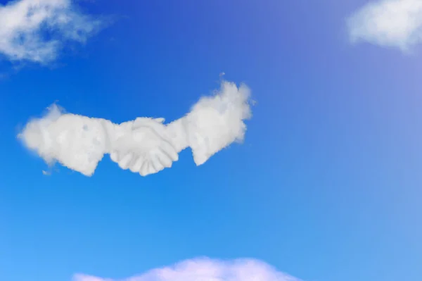 Cloud shape of contract agreement vision by business people shaking hands on blue sky.