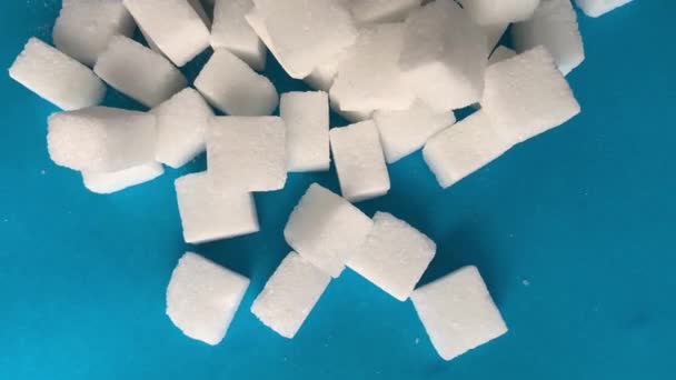 White Cubes Refined Sugar Falling Spinning Turntable Concept Harm Sweets — Stock Video