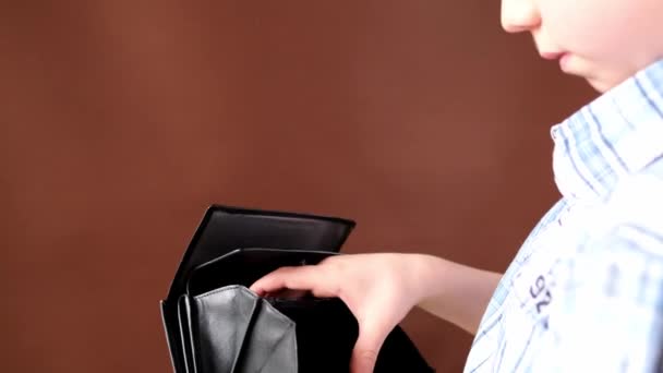 Child Kid Holding Black Leather Wallet Looking Money Hands Close — Stock Video