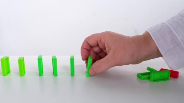 Close Falling Crumbling Dominoes Line Colored Domino Cubes Falling One — Stock Video
