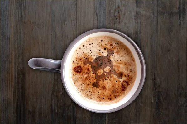 Cappuccino Káva Šedém Šálku Podšálku Starém Dřevěném Stole Lebka Tvaru — Stock fotografie