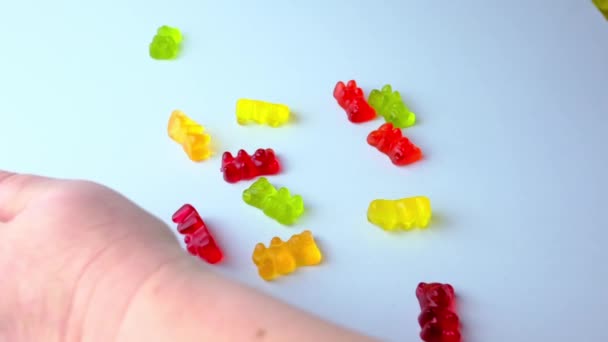 Red Orange Yellow Gelatin Candies Drug Filled Gelatin Bears Falling — Stock Video