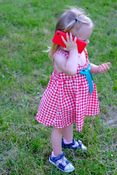 Small Child Year Old Girl White Hair Red Dress Holds — Stock Photo, Image