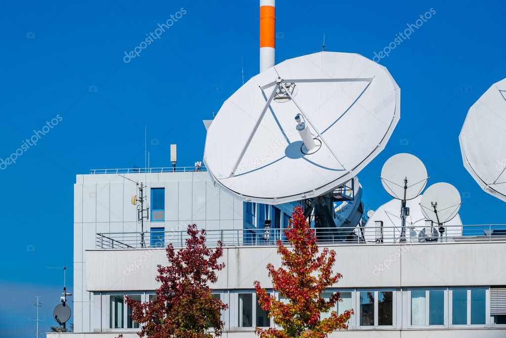Modern large satellite dishes equipment, ARD antenna, European public broadcaster, broadcast center, German telecommunications, headquarters media Hessischer Rundfunk in Frankfurt - October 1, 2025