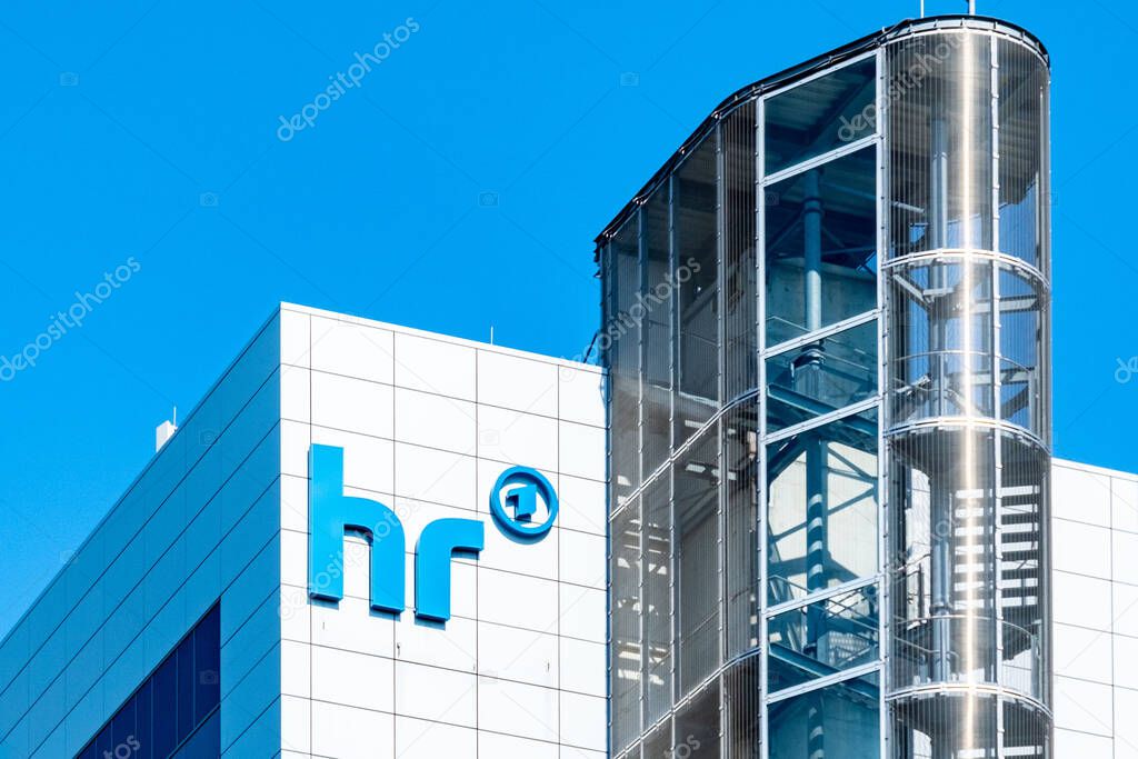 Modern building facade, hr logo, ARD 1 emblem, set against blue sky, European public broadcaster, German telecommunications, headquarters media Hessischer Rundfunk in Frankfurt - October 1, 2025